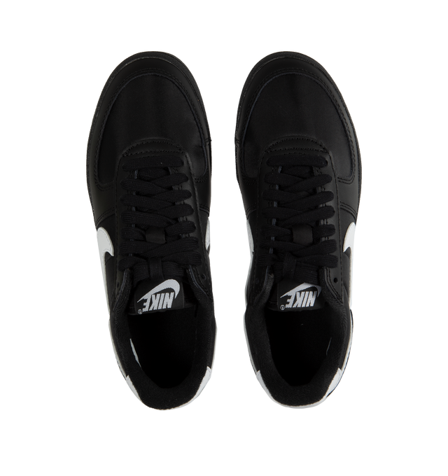 Image 5 of 5 - BLACK - NIKE Field General '82 in black with a vintage gridiron look and white Swoosh.  A mix of smooth leather, synthetic leather and tough textiles come together in classic White and Varsity Red, resting atop a nubby Black rubber waffle sole.  Featuring textile Upper with leather overlays, woven tongue label, printed branding at back and rubber outsole. 