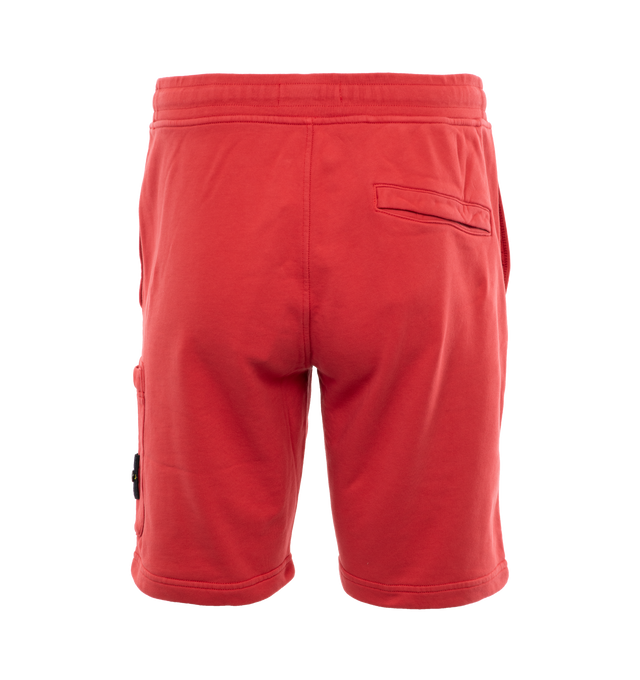 Image 2 of 4 - RED - STONE ISLAND Bermuda Shorts featuring regular fit, in-seam hand pockets, one back pocket with hidden snap fastening, patch pocket on the left leg bearing the Stone Island badge with hidden zipper closure, elasticized waist with outer drawstring and zipper closure. 100% cotton. 