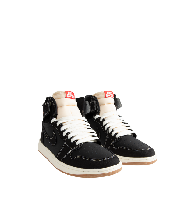 Image 2 of 5 - BLACK - Men's Air Jordan 1 Retro High OG Flight Club Sneakers feature a genuine leather and suede upper with the iconic high-top silhouette, signature Wings branding, and a stitched Swoosh for a timeless heritage look. These lifestyle sneakers combine encapsulated Air-Sole cushioning with a durable rubber outsole for lightweight comfort, lasting support, and reliable traction. Main Material: Genuine Leather and Suede. Midsole: Encapsulated Air-Sole Unit. Sole: Rubber. 