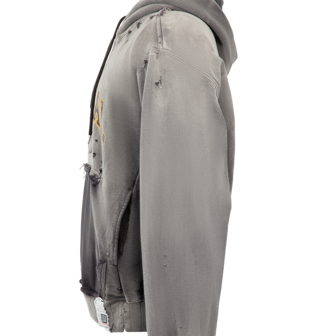 Image 3 of 3 - GREY - Maison Mihara Yasuhiro Men's Sun Faded Like Hoodie is crafted from cotton and features a sun-faded appearance with bleached and distressed detailing, a college-inspired graphic print, and a front kangaroo pocket. Main Material: 100% Cotton. Made in Japan. 
