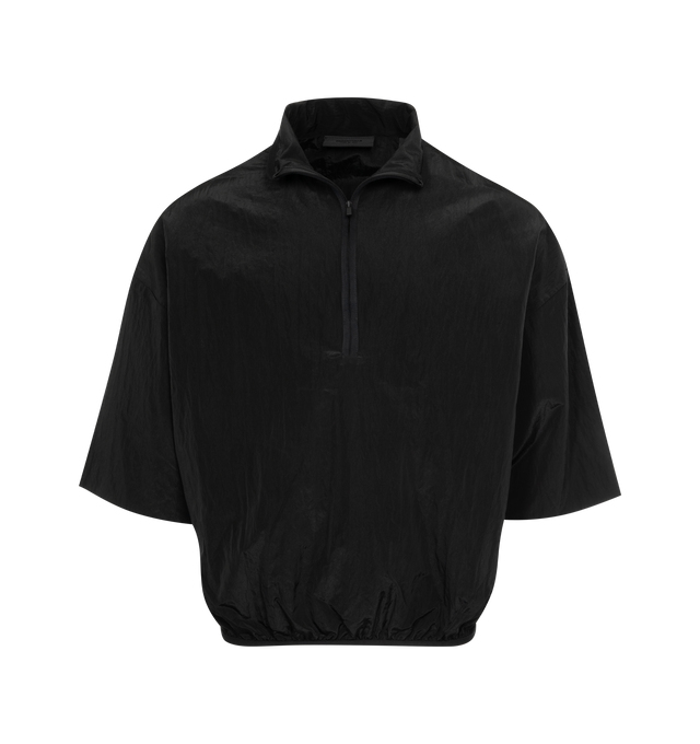 Image 1 of 2 - BLACK - FEAR OF GOD ESSENTIALS Halfzip Mockneck Shirt featuring short-sleeves, round, cropped silhouette, stretch binding at the mock neckline and waist hem, rubberized Essentials Fear of God black bar on the sleeve and a Fear of God rubberized label at the back collar. 100% nylon.  