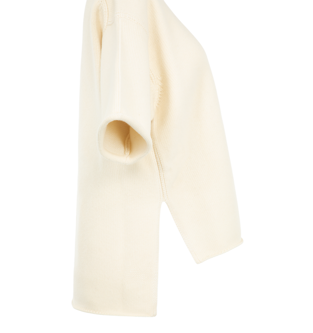 Image 3 of 3 - NEUTRAL - Bottega Veneta Women's short-sleeve knit sweater is a luxurious, boxy top crafted for a relaxed silhouette featuring a ribbed mock neckline with a front slit detail. Materials: 83% Wool 23% Polyester 2% Cashmere. 