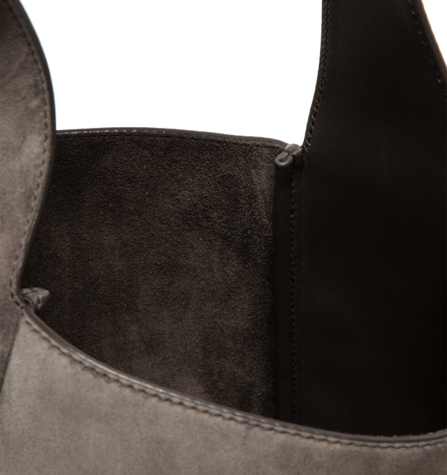 Image 4 of 4 - BROWN - SAINT LAURENT Le 5  7 Small Suede Bag featuring a removable zip pouch, leather tab closure decorated with the cassandre, adjustable strap, cotton lining and bronze-tone hardware. 9" x 8.7" x 3.1". Strap drop: 8.3". Calfskin. Made in Italy. 