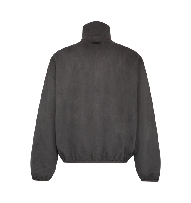 Image 2 of 3 - GREY - Fear of God ESSENTIALS Men's Suede Fleece Signature Modern Track Jacket with Piping is crafted from bonded suede fleece with a stretch perforated lining and features a modern relaxed-fit silhouette with a full-front zip closure. Designed with an embroidered ESSENTIALS signature logo and refined piping details, this elevated track jacket offers a plush suede-like hand feel while maintaining enhanced breathability. Finished with elastic binding at the collar, cuffs, and hem, along with s 