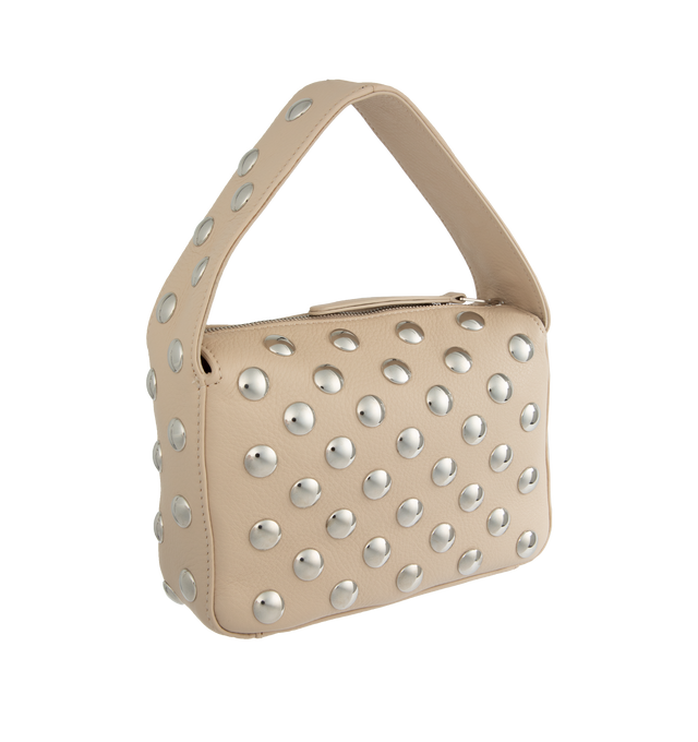 Image 2 of 3 - NEUTRAL - KHAITE Elena Small Handbag with Silver Studs featuring a sculptural, studded interpretation of a classic box bag at a compact scale. With integrated strap, zippered top, and internal slip pocket. 5 in x 2.75 in x 7.5 in. Handle drop: 4 in. 100% calfskin. Zamac studs, nappa lining. 