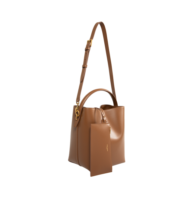 Image 2 of 3 - BROWN - SAINT LAURENT Le 37 Bucket Bag featuring metal cassandre hook closure, one zipped pouch, suede lining, and four metal feet. 20 X 25 X 16cm. Handle drop: 9cm. Strap drop: 40cm. 100% calfskin leather. Made in Italy.  