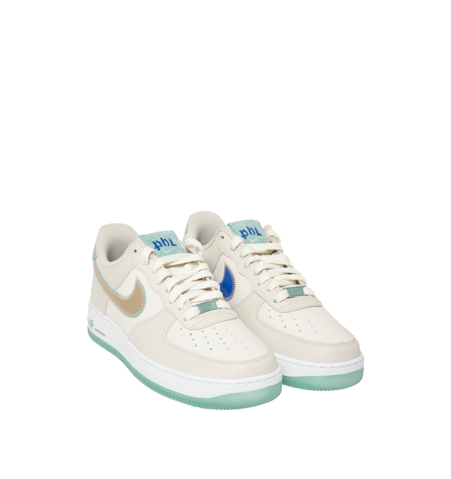 Image 2 of 5 - NEUTRAL - Nike Men Air Force 1 '07 "Easter" Sneaker featuring classic silhouette with leather for a crisp, clean look, genuine leather upper with perforated toe box, Nike Air unit, rubber outsole with classic pivot circles and padded collar. 