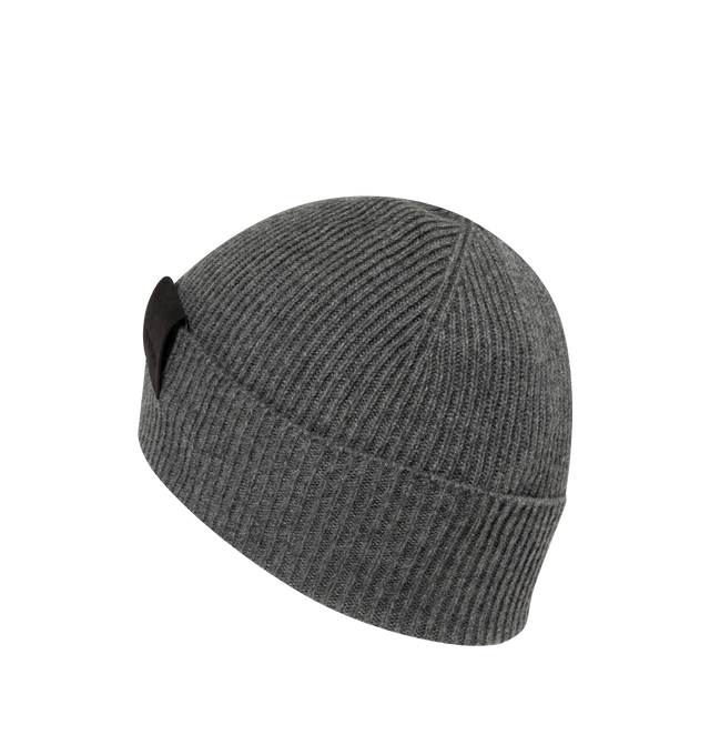 Image 2 of 2 - GREY - Tom Ford Men's Ribbed Cashmere Beanie Hat is crafted from a soft cashmere ribbed knit and features a foldover cuff accented with a leather tab embossed with the signature TF monogram. This designer knit beanie combines timeless cold-weather styling with refined detailing for elevated everyday wear. Main Material: Ribbed Knit. Trim: Leather. Made in Italy. 