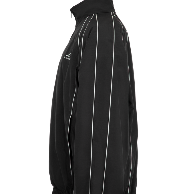 Image 3 of 3 - BLACK - Balenciaga Men's Bodies Tracksuit Jacket is crafted from technical cotton poplin and features a high collar and double-ended zip closure. Reflective piping and Bodies artwork at the chest create a reflective effect, while two front slash pockets and gathered cuffs and hem complete the design. Main Material: 50% Cotton, 50% Polyamide. Lining: 100% Polyester. Made in Italy. 