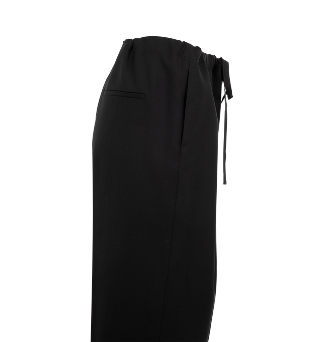 Image 3 of 3 - BLACK - Khaite relaxed, pleated-front pant refined by tropical wool. With grommeted drawstring waist, in-seam side pockets, and back welt pocket. Tropical wool (100% wool). Dry clean. 