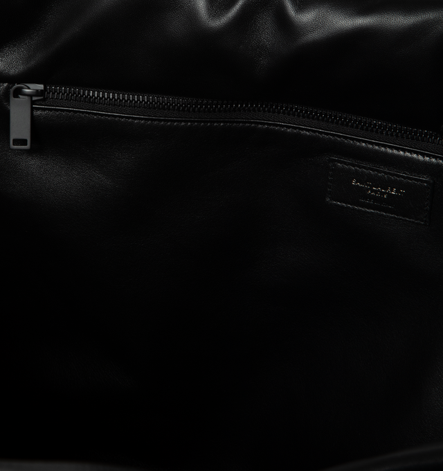Image 3 of 3 - BLACK - SAINT LAURENT Puffer Tote featuring one zip pocket, leather lining and Saint Laurent signature. 16.119.7 X 16.9 X 6.7 inches. Handle drop: 7.5 inches. 98% lambskin, 2% metal. 