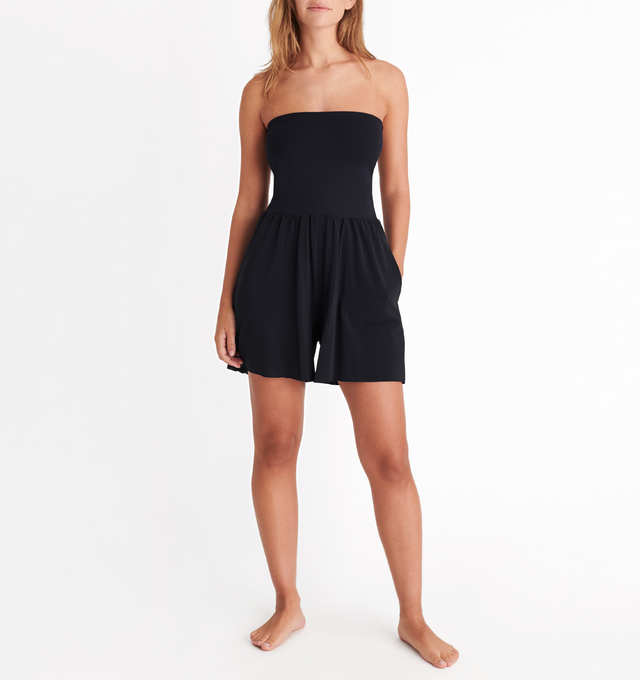Image 2 of 6 - BLACK - ERES Lucia Shorts featuring side pockets with tone-on-tone stitching. Has versatile styling to also be worn as a bustier playsuit. Main: 94% Polyamid, 6% Spandex. Second: 84%  Polyamid, 16% Spandex. Made in France. 