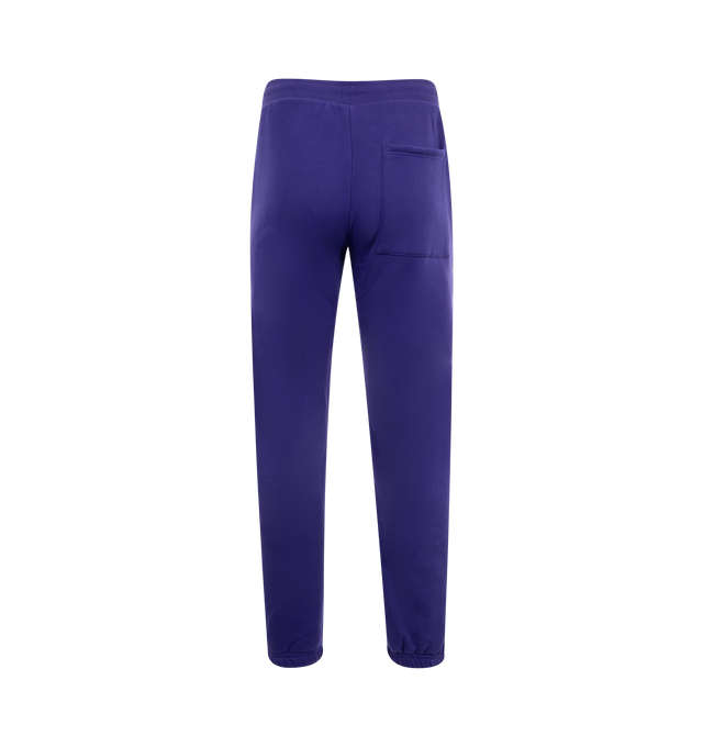 Image 2 of 3 - PURPLE - Pleasures Onyx Sweatpants have an elastic drawstring waist, side pockets, a back patch pocket, logo embroidery, and elastic cuffs. 57% cotton, 43% polyester.  