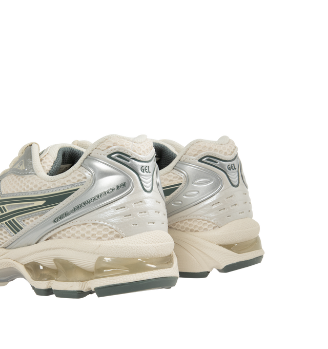 Image 3 of 5 - WHITE - Asics GEL-Kayano 14 Sportstyle Sneakers are lace-up style with rip-stop underlays, GEL cushioning, and TRUSSTIC support system. Unisex style in men's sizes. 