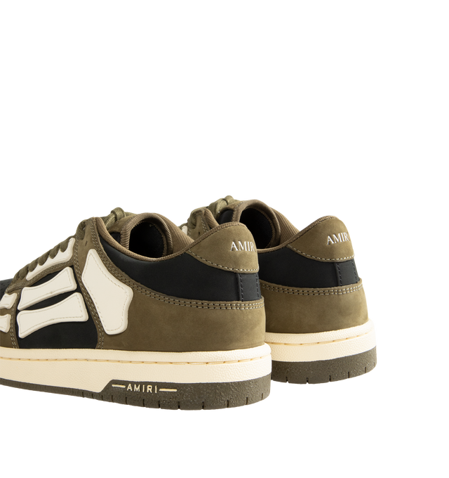 Image 3 of 5 - GREEN - Amiri Mens Skel Top Low Sneakers are crafted with a suede leather upper and signature pebbled leather bone appliqus. Feature contrast topstitching, lace-up closure, padded collar, two-tone rubber sole, and low-top silhouette. Main Material: Leather Upper; Sole: Rubber. Made in Vietnam. 