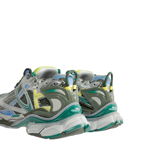 Image 3 of 5 - BLUE - Balenciaga Men's Gradient Runner Sneakers are crafted from polyurethane and polyester and feature a sportswear-inspired silhouette with a deliberately worn-in finish. Designed with printed sizing at the edge of the toe, embossed sizing at the heel, a Runner logo at the exterior, Balenciaga logo embroidery at the tongue, and logo detailing at the back of the heel, this statement sneaker blends performance-inspired design with the house's signature distressed aesthetic. Main Material: Po 