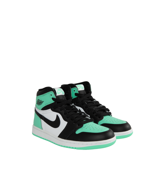 Image 2 of 5 - GREEN - Air Jordan 1 Retro High OG "Green Glow" classic sneaker crafted from premium materials in a fresh mint green color. Leather upper offers durability and structure.Encapsulated Air-Sole units provide lightweight cushioning. Solid rubber outsoles give you traction on a variety of surfaces. Signature Wings logo stamped on collarStitched-down Swoosh logo. 