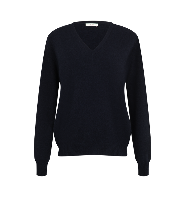 Image 1 of 2 - BLUE - The Row Women's Pihla Top is crafted from baby cashmere and features a classic V-neckline, long sleeves, and seamless construction for a clean, minimalist silhouette. This designer baby cashmere sweater combines exceptional Italian craftsmanship with a featherlight double-ply knit, offering luxurious softness, lightweight warmth, and effortless everyday elegance. Main Material: 100% Baby Cashmere. Made in Italy. 