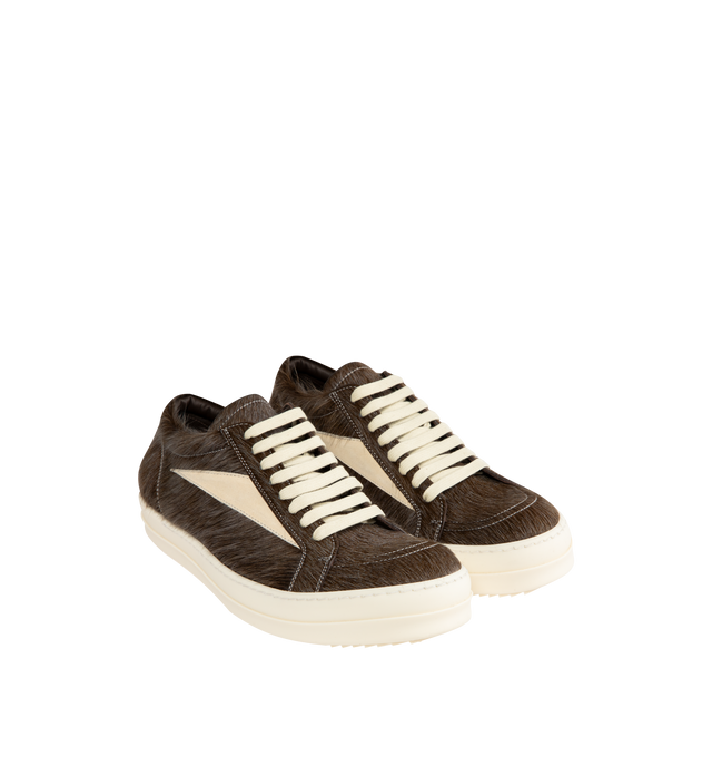 Image 2 of 5 - BROWN - RICK OWENS Vintage Sneaks featuring unshaved cow leather and full grain calf leather, under-ankle height, eight eyelets with laces, toe caps and shark-toothed bumper soles, triangular leather applique on the side foot, a padded ankle and contrast stitching. 100% cow real fur. Lining: 100% calf leather. Made in Italy. 