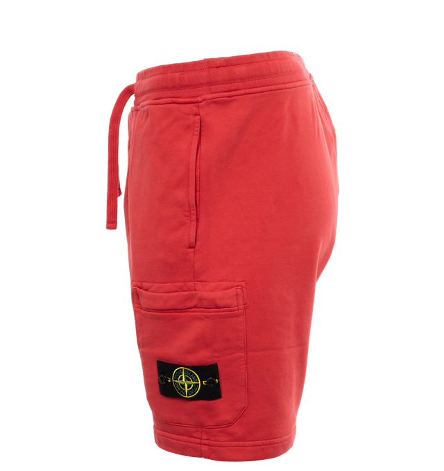 Image 3 of 4 - RED - STONE ISLAND Bermuda Shorts featuring regular fit, in-seam hand pockets, one back pocket with hidden snap fastening, patch pocket on the left leg bearing the Stone Island badge with hidden zipper closure, elasticized waist with outer drawstring and zipper closure. 100% cotton. 
