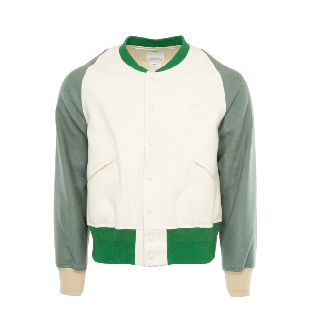 Image 1 of 3 - GREEN - Visvim Logo-patch felted varsity jacket in a wool blend with off-white and green color-block panelled design featuring logo patch at the chest, ribbed band collarfront press-stud fastening, long sleeves, ribbed cuffs and hem, two side slit pockets and satin lining. Outer: Cotton 100%, Wool 62%, Linen/Flax 38%.  Lining: Rayon 100%.  