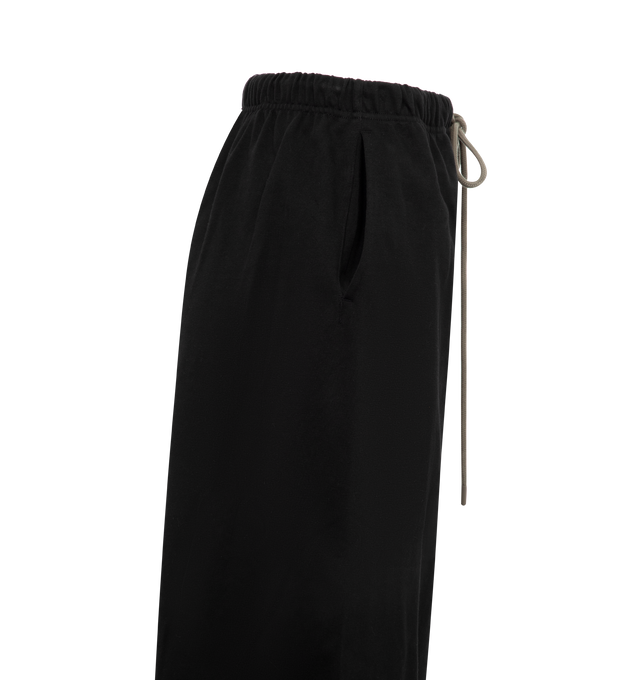Image 3 of 3 - BLACK - FEAR OF GOD ESSENTIALS Long Skirt featuring elastic drawstring waist, midi length, side pockets and logo on front. 100% cotton.  