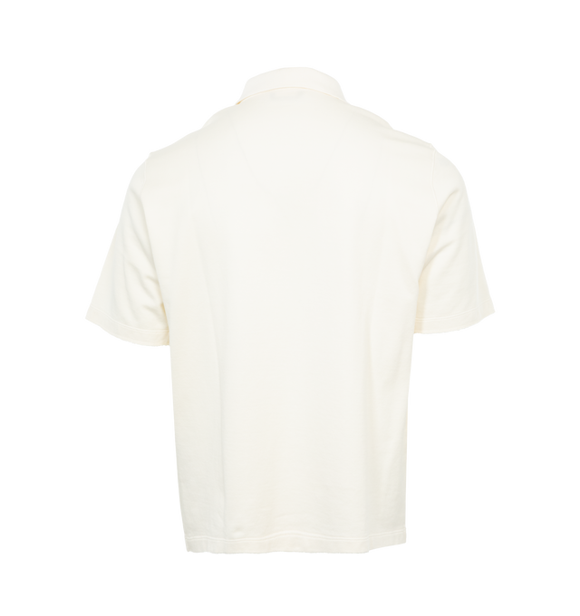Image 2 of 3 - WHITE - STONE ISLAND Ghost Polo Shirt featuring regular fit, ribbed collar with hidden two-snap fastening, small tone-on-tone Stone Island lettering print low on chest and raw-edged finish on sleeves. 100% cotton. 