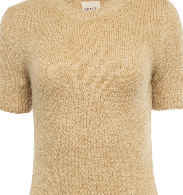 Image 3 of 3 - NEUTRAL - KHAITE Helen Dress featuring crewneck, knit in Italy of lustrous "eyelash" yarn, engineered ribbing at hem and slips on. 58% silk, 42% cashmere. 