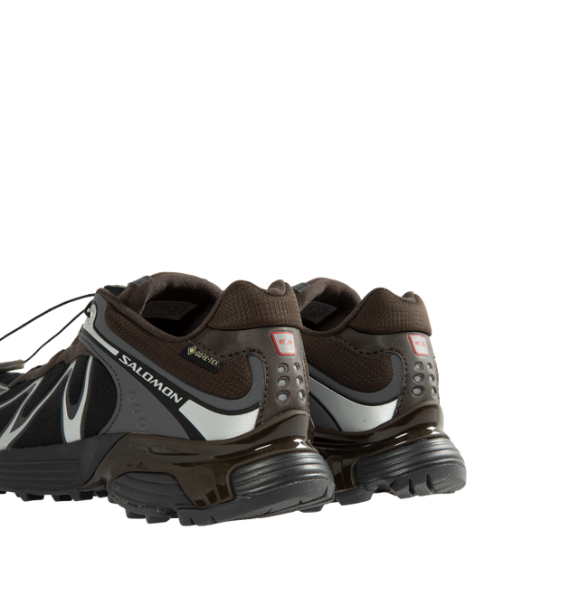 Image 3 of 5 - BROWN - Salomon Unisex XT-Whisper GORE-TEX Sneakers reimagine a trail-inspired icon with a modern performance-driven design. Crafted with a waterproof and breathable GORE-TEX membrane, this versatile style is engineered for all-weather wear while maintaining lightweight comfort and protection.Main Material: Synthetic and Textile Upper. Membrane: GORE-TEX Waterproof Protection. Closure: Quicklace System. Outsole: Contagrip Rubber.*Unisex style in men's sizing. 