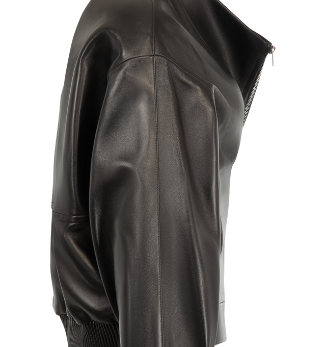 Image 3 of 3 - BLACK - Khaite Women's Leather Ixin Jacket is crafted from lambskin leather and features a relaxed, cropped silhouette shaped by a funnel neckline. Designed with a two-way zip closure, elasticated hem, fitted cuffs, and on-seam pockets. Main Material: 100% Lambskin Leather Made in Italy. 