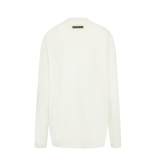 Image 2 of 2 - WHITE - FEAR OF GOD ESSENTIALS Classic Fit Long Sleeve Tee featuring pull-on styling, a semi-sheer fabric, lightweight jersey fabric, long sleeves and crewneck. 60% cotton, 40% polyester. 
