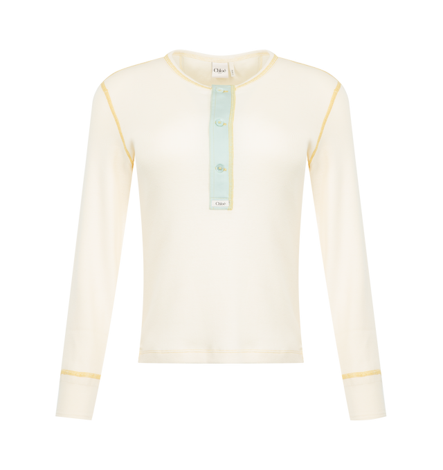 Image 1 of 2 - NEUTRAL - Chlo Womens Henley Shirt is crafted from flatlock ribbed organic cotton jersey. Features a fitted silhouette, Henley neckline with mother-of-pearl button closure, long sleeves, contrast trim, embroidered logo at the back neck, and logo patch at the button placket. Main Material: 100% Organic Cotton; Buttons: 100% Mother-of-Pearl. Made in Portugal. 