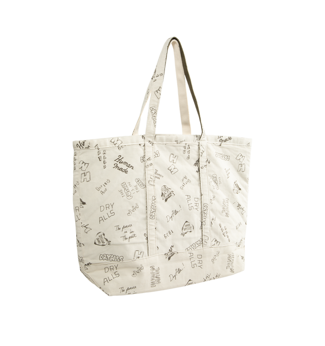 Image 2 of 3 - CREAM - Human Made Men's Corduroy Tote is crafted from finely textured cotton corduroy and features hand-drawn-style graphic artwork, interior and exterior pockets, and A3-size storage capacity. Designed for everyday functionality, this tote is lined with cushioned khaki quilting and finished with signature heart logo embroidery for a distinctive Human Made touch. Main Material: Shell: 100% Cotton. Lining: 100% Polyester. Filling: 100% Polyester. Dimensions: 16.5 x 15 x 5.5 in. Interior: Inte 