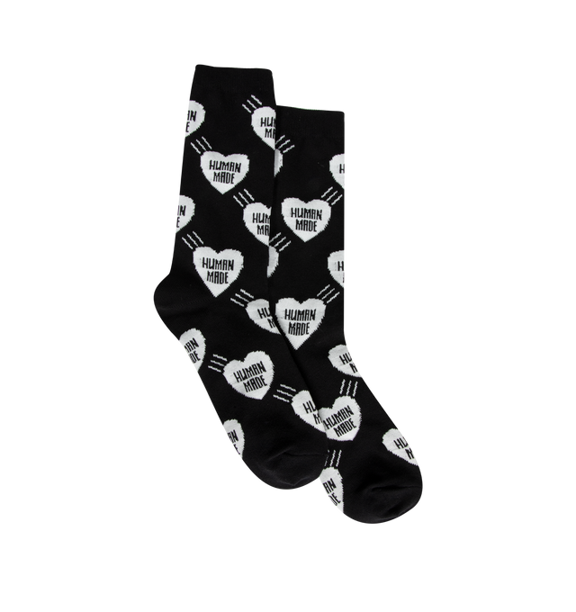 Image 1 of 2 - BLACK - Human Made Heart Socks are crafted from a lightweight cotton-blend fabric and feature a mid-length silhouette with an allover heart logo pattern. Designed with jacquard-woven heart graphics, elastic cuffs, and signature HUMAN MADE branding that adds a playful accent to everyday wear. Main Material: 48% Cotton, 19% Nylon, 18% Acrylic, 13% Polyester, 2% Spandex.  