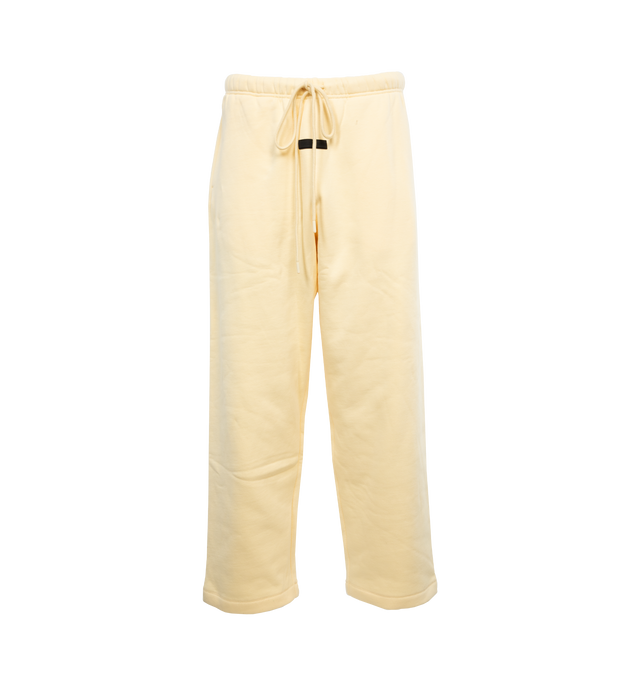 YELLOW - FEAR OF GOD ESSENTIALS Relaxed Lounge Pants featuring drawstring at elasticized waistband, two-pocket styling, rubberized logo patch at front and logo flocked at leg. 80% cotton, 20% polyester. Made in China.
