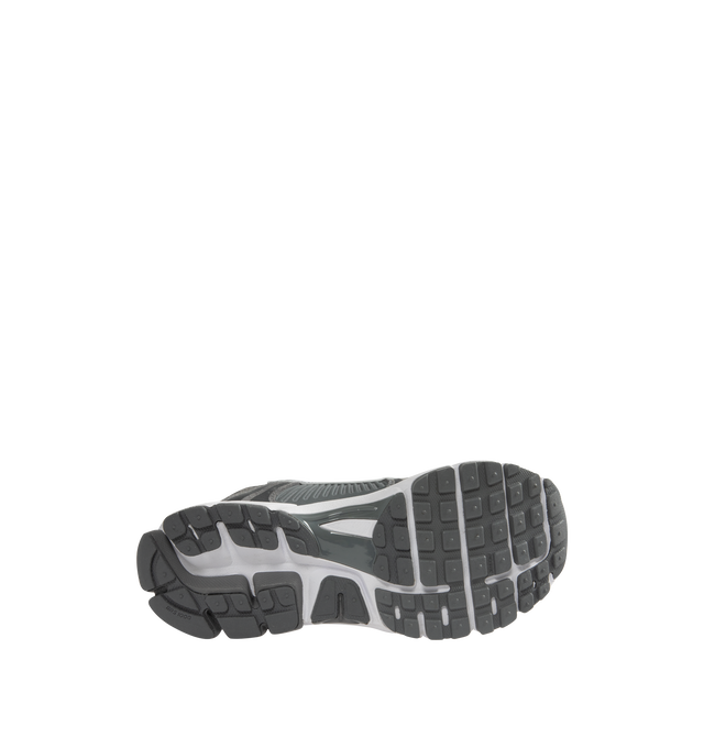 Image 4 of 5 - GREY - NIKE Zoom Vomero 5 Sneaker featuring upper with real and synthetic leather for a layered, mesh panels and ventilation ports on the heel, Zoom Air cushioning, plastic caging on the side, rubber outsole and reflective details. 