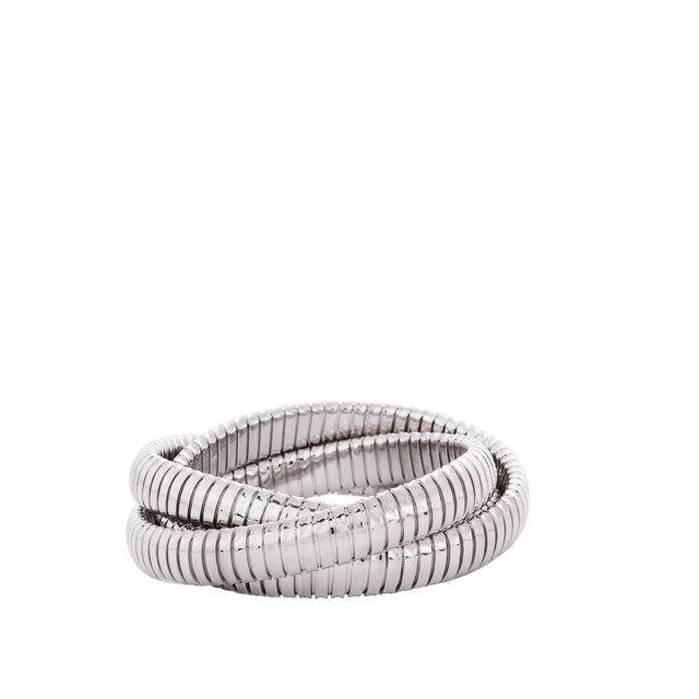 Image 1 of 1 - SILVER - SIDNEY GARBER Rolling Bracelet: 18K White Gold.This iconic three-strand bracelet is handmade from a continuous piece of flexible, lightweight, 18k Gold. It wraps around itself seamlessly and forms a shiny stack. As many as four can be worn together. 18k White Gold Each Band 9mm Width Handmade. 
