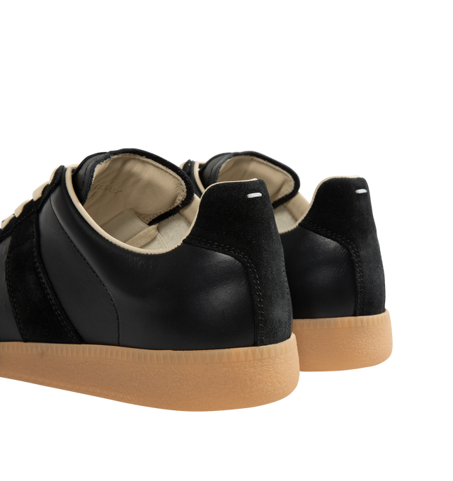 Image 3 of 5 - BLACK - MAISON MARGIELA Replica Sneakers featuring a classic low-top silhouette, contrast of matte leather and a patent sprayed finish, paint splatter detail, lace-up construction and rubber sole. Made in Italy. 