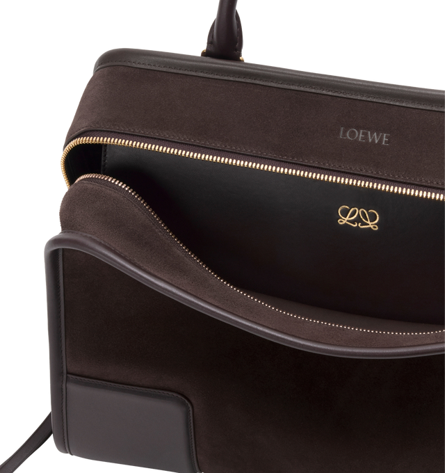 Image 11 of 16 - BROWN - LOEWE Large Amazona 180 Bag in suede featuring a relaxed silhouette anchored by a single toron top handle, designed to be carried open while a concealed closure secures the main compartment, removable shoulder and crossbody straps, zip closure with two leather zip pullers, two compartments, main compartment closed with magnetic closure, internal flat pocket, left side d-ring for customization, suede and nappa lambskin lining, embossed LOEWE and embossed double L branding. Suede/calf 