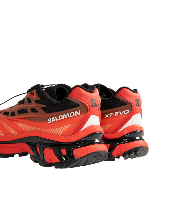 Image 3 of 5 - RED - Salomon XT-EVO Sneakers are crafted from synthetic and textile materials and feature an evolved XT silhouette inspired by competitive trail running and exploration. Defined by sharp, aggressive lines and a race-ready aesthetic, this performance-driven style combines lightweight construction with Salomon's signature Quicklace system for a secure fit. Finished with a textile lining, textile insole, and durable rubber outsole, the XT-EVO delivers comfort, support, and traction for everyday 