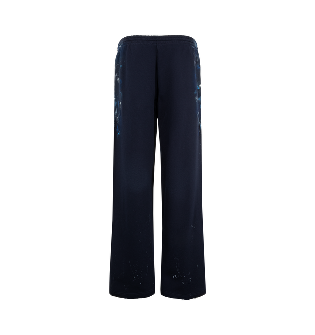 Image 2 of 3 - NAVY - Balenciaga Men's Paint Splatter Baggy Sweatpants are crafted from faded black dry cotton fleece and feature a mid-rise, oversized silhouette. An elasticated drawstring waistband, and Balenciaga artwork at the front complete the design. Main Material: 100% Cotton. Pocket Lining: 100% Cotton. Made in Portugal. 