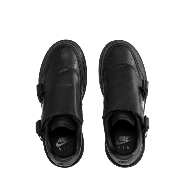 Image 5 of 5 - BLACK - Nike Men's Air Force 1 LX Shoes are crafted from genuine leather and feature the iconic Air Force 1 silhouette with a metallic Swoosh logo and leather lace cover for an elevated finish. The leather upper softens over time, while a Nike Air unit delivers lightweight cushioning. A foam midsole enhances comfort, and the rubber outsole with classic pivot-circle traction provides durability and grip. Upper: Genuine Leather. Midsole: Foam with Nike Air cushioning. Outsole: Rubber.  