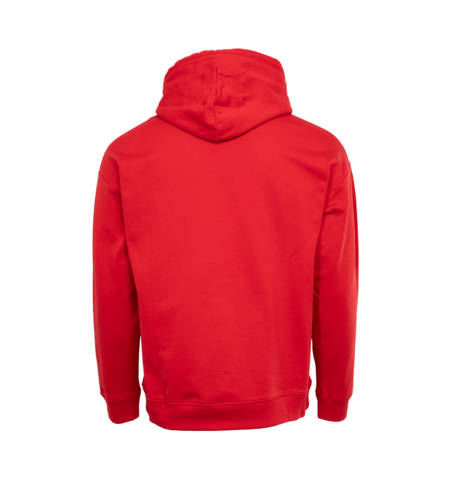 RED - LOEWE Relaxed Fit Hoodie featuring relaxed fit, regular length, LOEWE Anagram embossed leather patch pocket at the chest, hooded collar, drawstring with LOEWE embossed tab and ribbed cuffs and hem. 100% cotton. 