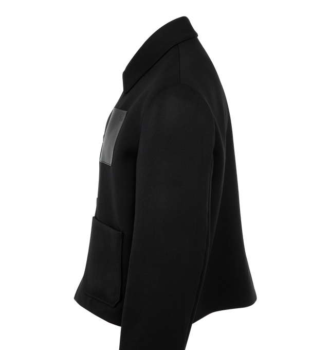 Image 3 of 3 - BLACK - Loewe WorkwearJacket in medium-weight cavalry wool twill. Relaxed fit, regular length featuring classic collar, button front fastening, Anagram embossed leather chest patch pocket and LOEWE engraved D-ring placed at the front pocket. Fully lined. Main material: Wool. Made in Italy. 