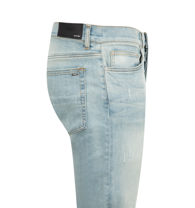 Image 3 of 3 - BLUE - Amiri Ultrasuede MX1 Jeans are a 5-pocket style with hand distressing, and pleated suede repairs. 92% cotton, 6% elastomultiester, 2% elastane. 100% ultrasuede. Made in USA.  