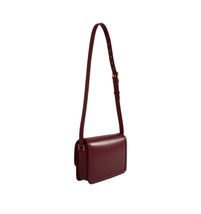 Image 2 of 3 - RED - SAINT LAURENT medium leather satchel with flap featuring push-lock closure, 2 inner pockets, adjustable shoulder strap and metal logo hardware. Measures 9 X 6.2 X 2.3 inches with 15.3 inch drop strap.  Made in Italy. 