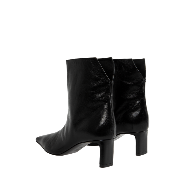 Image 3 of 4 - BLACK - Khaite Ona square-toed ankle boot in black glazed leather featuring sleek blade heel, tonal outsole and a distinctively notched back enhances the pull-on ease. Suede calfskin (100% calfskin). Made in Italy . 