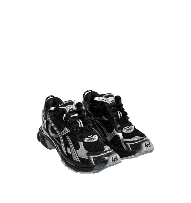 Image 2 of 5 - BLACK - BALENCIAGA Runner Sneakers featuring lace-up closure, pull-loop at heel collar, logo rubberized at heel tab, textured foam rubber midsole and treated rubber outsole. Upper: textile, synthetic, rubber. Sole: rubber. Made in China. 