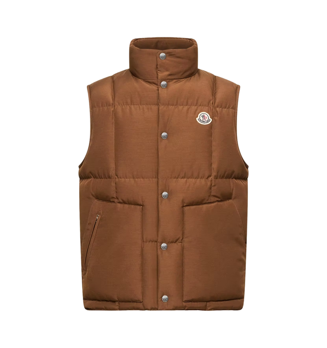 Image 1 of 1 - BROWN - Moncler Brumelune Short Down Vest is a versatile layering piece that combines lightweight warmth with a relaxed, vintage-inspired aesthetic. Filled with premium down insulation, this contemporary vest delivers everyday comfort while showcasing Moncler's signature blend of functionality and refined style. EXTERIOR: 82% Polyester, 18% Cotton; LINING: 100% Polyester; PADDING: 90% Down, 10% Feather 