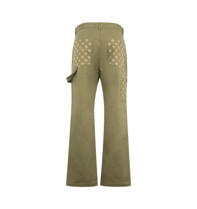 Image 2 of 3 - GREEN - Amiri Mens MA Quad Cotton Carpenter Jeans are crafted from cotton jacquard denim. Features custom-woven MA Quad monogram, classic five-pocket construction, contrasting front patch panels, carpenter hammer loop, and zip-fly with button closure. Main Material: 100% Cotton. Made in Italy. 